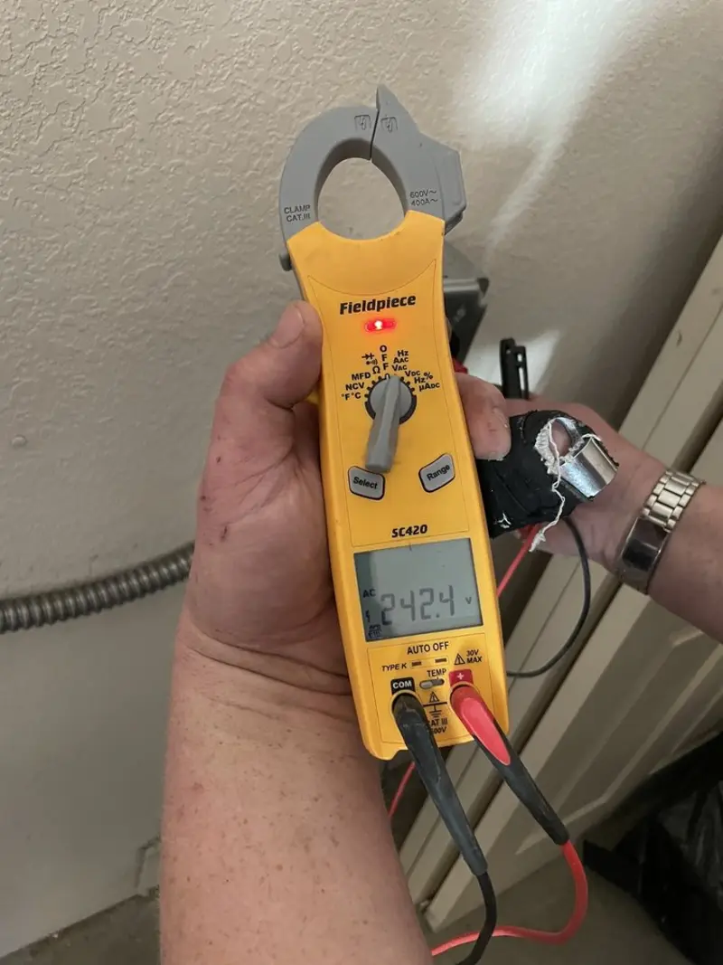 Voltage testing with clamp meter during Circuit Breaker Repair in Patchogue